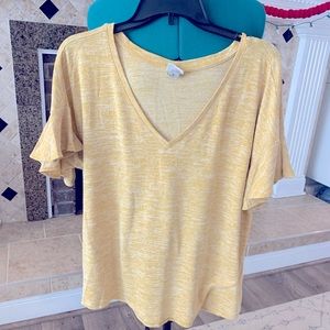 A New Day loose fitting top with flutter sleeves.